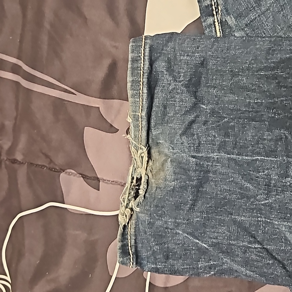 A pair of boot-cut Miss Me jeans